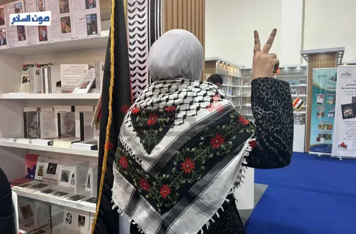 بالعلم والشال.. تفاصيل مشاركة "فلسطين والسودان" بمعرض الكتاب
